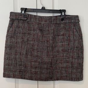 Woman’s grey mini skirt